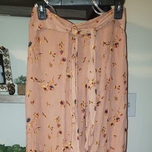 Thigh-high slits, wide-leg pant.